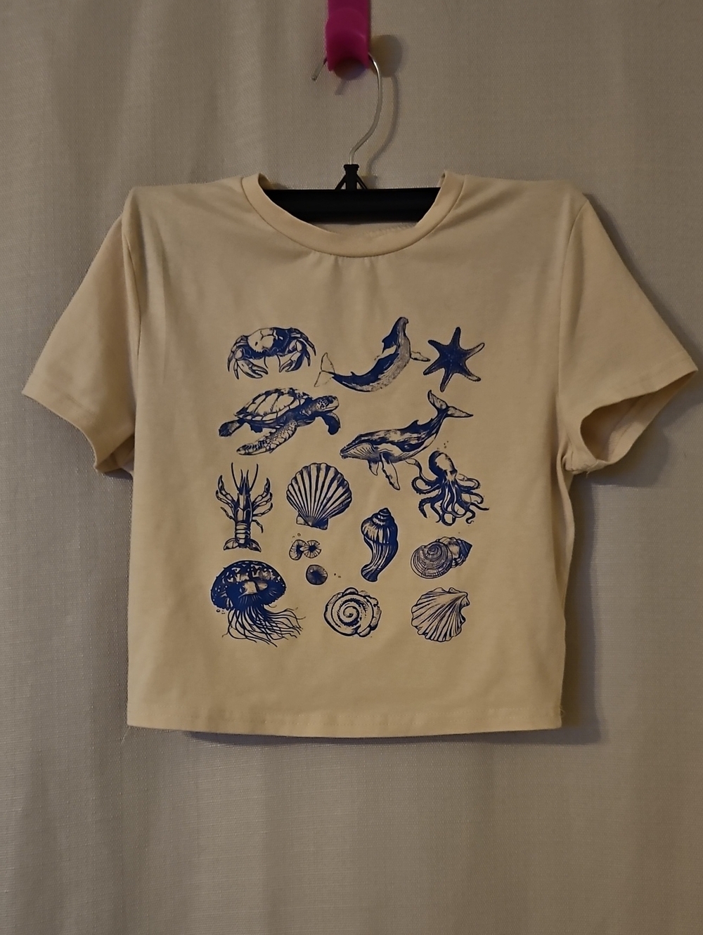 SHEIN Cream Crop Tee with Blue Marine Graphic